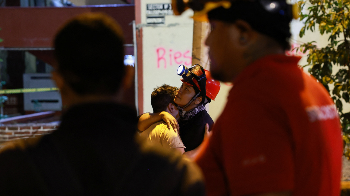 Race to reach trapped survivors offers hope in Colombia quake zone