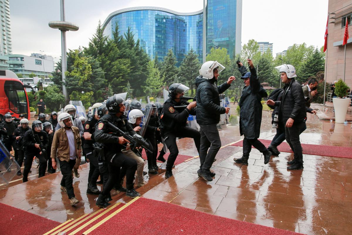 Turkish riot police enter the headquarters of the main opposition Republican People's Party (CHP) to evict its ousted leadership, after authorities ordered enforcement of a court ruling removing the party's leadership from the building, in Ankara, Turkey, May 24, 2026. REUTERS/Efekan Akyuz