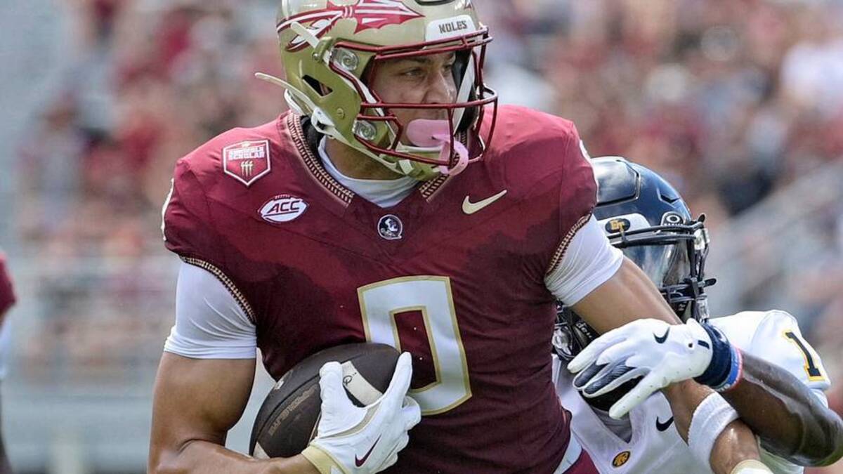  Sep 6, 2025; Tallahassee, Florida, USA; Florida State Seminoles wide receiver Duce Robinson (0) catches a pass over East Texas A&M Lions cornerback Kaleb Miles (1) during the first half at Doak S. Campbell Stadium. Mandatory Credit: Melina Myers-Imagn Images | IMAGN IMAGES via Reuters Connect 