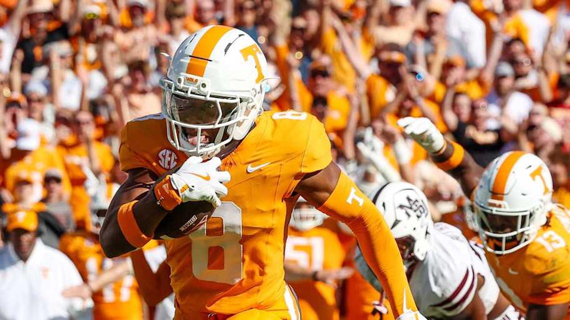  Sep 27, 2025; Starkville, Mississippi, USA; Tennessee Volunteers defensive back Colton Hood (8) runs with the ball after an interception against the Mississippi State Bulldogs during the first half at Davis Wade Stadium at Scott Field. Mandatory Credit: Wesley Hale-Imagn Images | Wesley Hale-Imagn Images 