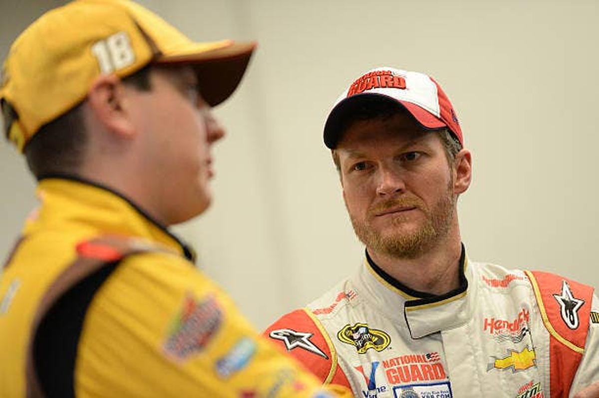  Dale JR listens to Kyle Busch during a conversation at Daytona. (Photo by Patrick Smith/NASCAR via Getty Images) (Photo by Patrick Smith/NASCAR via Getty Images)
