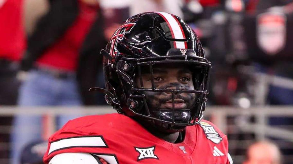  Texas Tech's Lee Hunter walks to the field before the Big 12 Conference championship football game, Saturday, Nov. 6, 2025, at AT&T Stadium in Arlington. | Nathan Giese/Avalanche-Journal / USA TODAY NETWORK via Imagn Images 