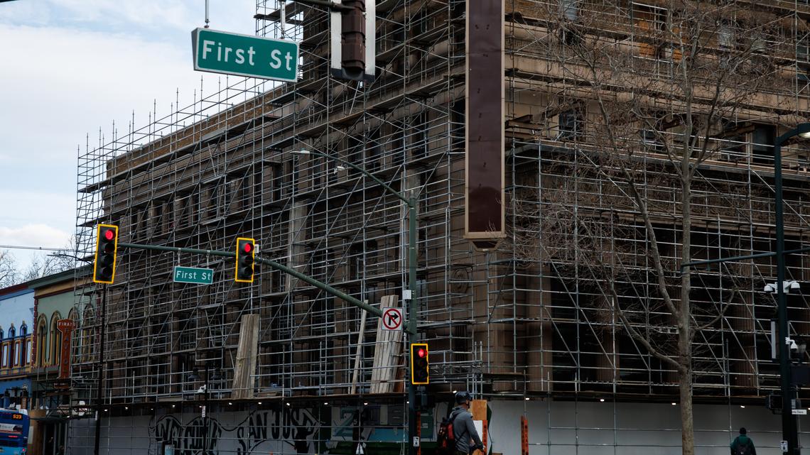 Scaffolding covers the historic Bank of Italy tower in downtown San Jose Tuesday, Jan. 27, 2026. Canada-based Westbank, the primary owner of the 14-story tower at 12 South First St., intends to transform the building, a longtime office structure, into an apartment high-rise. (Dai Sugano/Bay Area News Group)