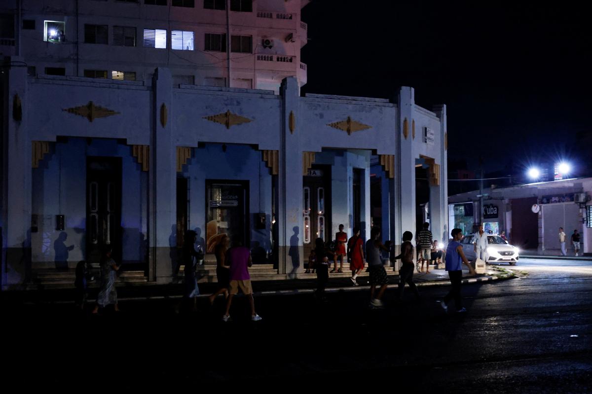 People protest against frequent power cuts as the capital Havana faces its worst rolling blackouts in decades amid a U.S. blockade that has strangled the island of fuel, in Havana, Cuba, May 13, 2026. REUTERS/Norlys Perez