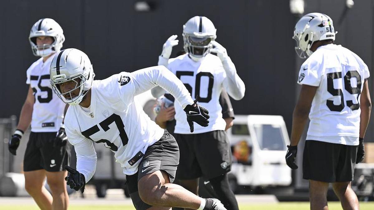  May 20, 2026; Henderson, NV, USA; Las Vegas Raiders linebacker Cameron McGrone (57) practices during organized team activities at Intermountain Health Performance Center. Mandatory Credit: Candice Ward-Imagn Images | Candice Ward-Imagn Images 