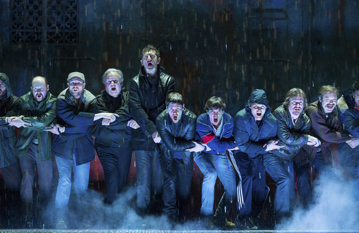 FILE -- The cast performs a scene from the musical "The Last Ship" at Neil Simon Theater in New York, Oct. 24, 2014. After his 2014 musical failed on Broadway, Sting is bringing a revised version of it to the Metropolitan Opera for a limited run in June 2026. (Sara Krulwich/The New York Times)