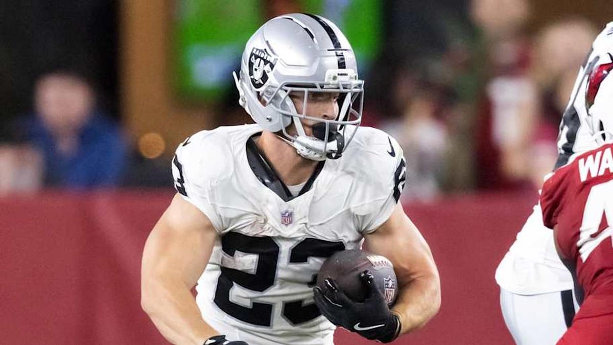  Aug 23, 2025; Glendale, Arizona, USA; Las Vegas Raiders running back Dylan Laube (23) against the Arizona Cardinals during a preseason NFL game at State Farm Stadium. Mandatory Credit: Mark J. Rebilas-Imagn Images | Mark J. Rebilas-Imagn Images 
