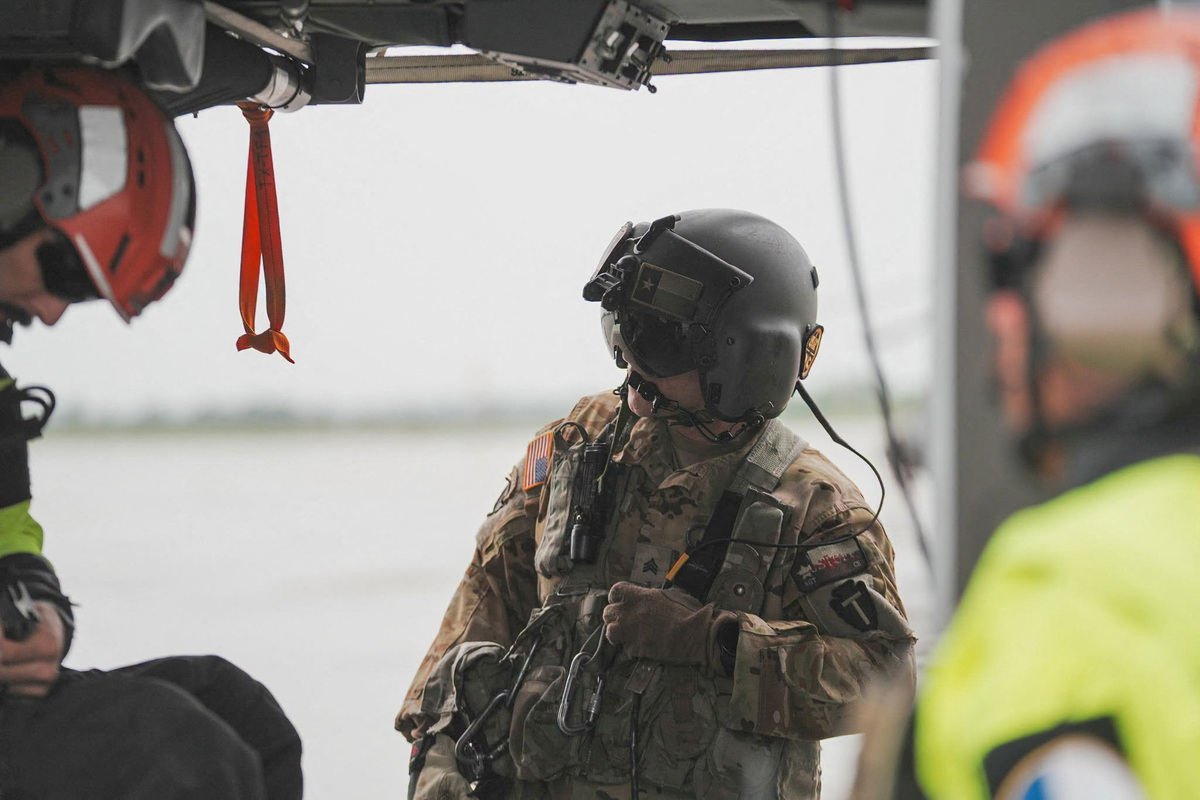 A Texas Military Department member looks on while taking part in an operation to provide support amid heavy rains and severe weather, in West-Central Texas, U.S., in this handout picture released July 16, 2026. Texas Military Department/Handout via REUTERS