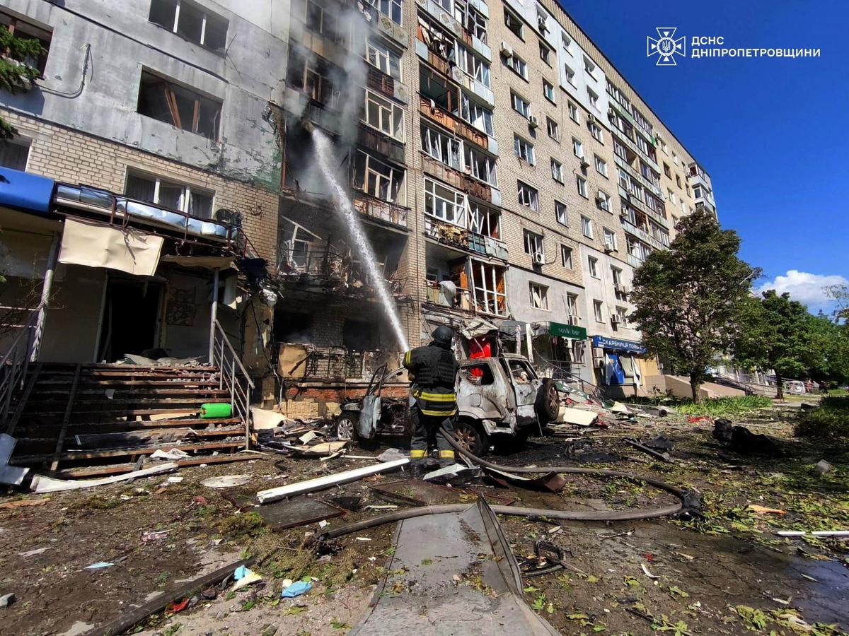A rescuer works at a site of an apartment building hit by a Russian drone strike, amid Russia's attack on Ukraine, amid Russia's attack on Ukraine, in the town of Pavlohrad, Dnipropetrovsk region, Ukraine in this handout picture released May 25, 2026. Press service of the State Emergency Service of Ukraine in Dnipropetrovsk region/Handout via REUTERS