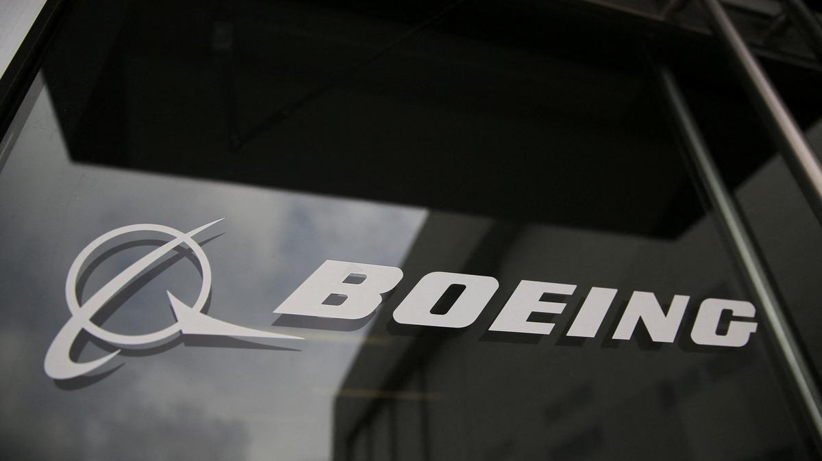 The Boeing logo on the doors to the Boeing factory in Renton, Washington, U.S., April 15, 2026.   REUTERS/Genna Martin
