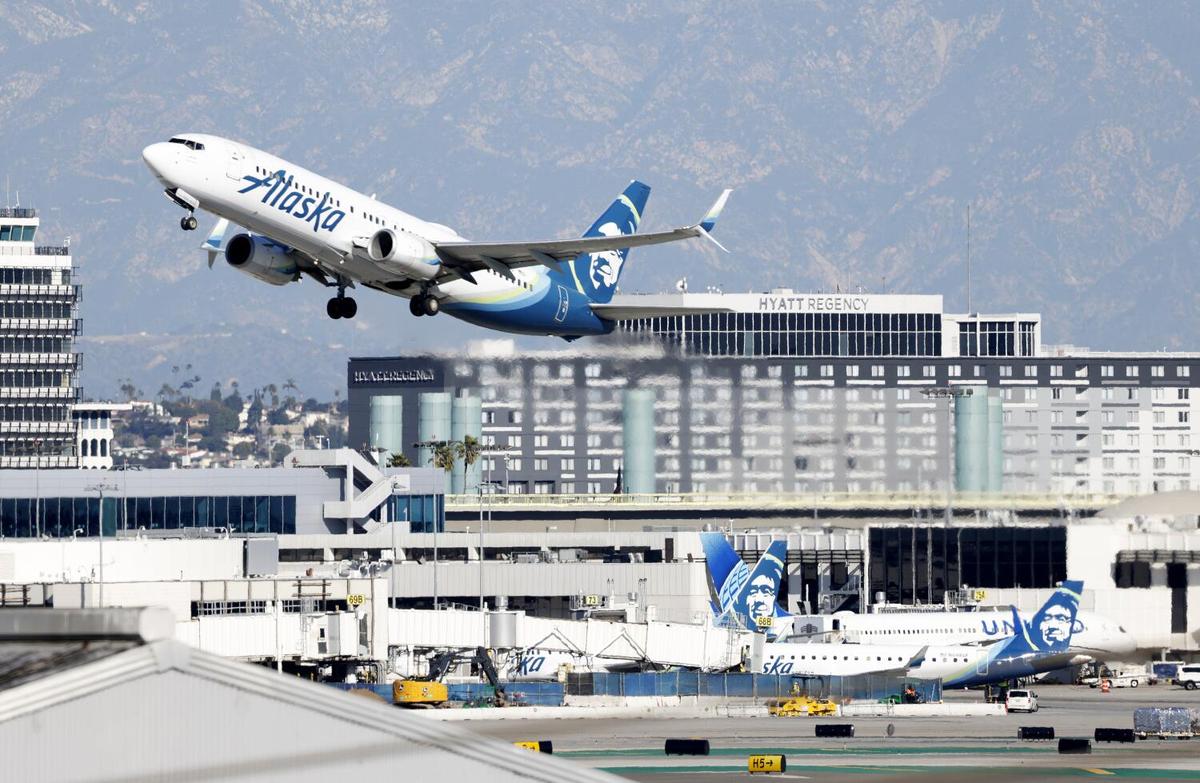 An Alaska Airlines flight takes off from Los Angeles International Airport on January 8, 2024. 