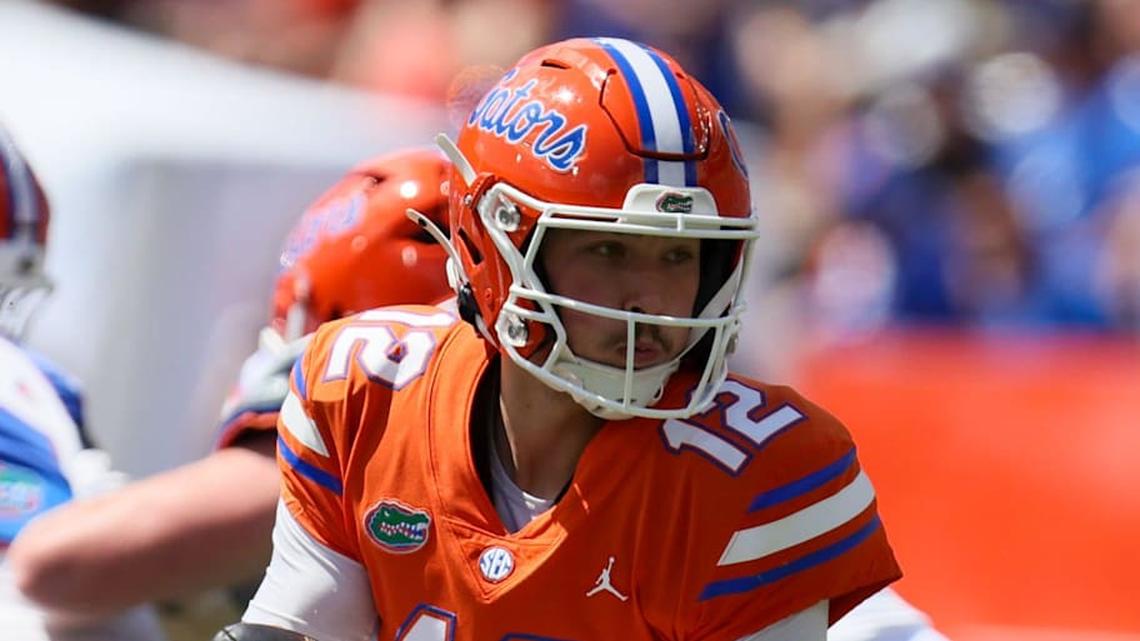  Florida quarterback Aaron Philo (12) rolls out during the second half of the Orange and Blue game. | Alan Youngblood/Gainesville Sun / USA TODAY NETWORK via Imagn Images 