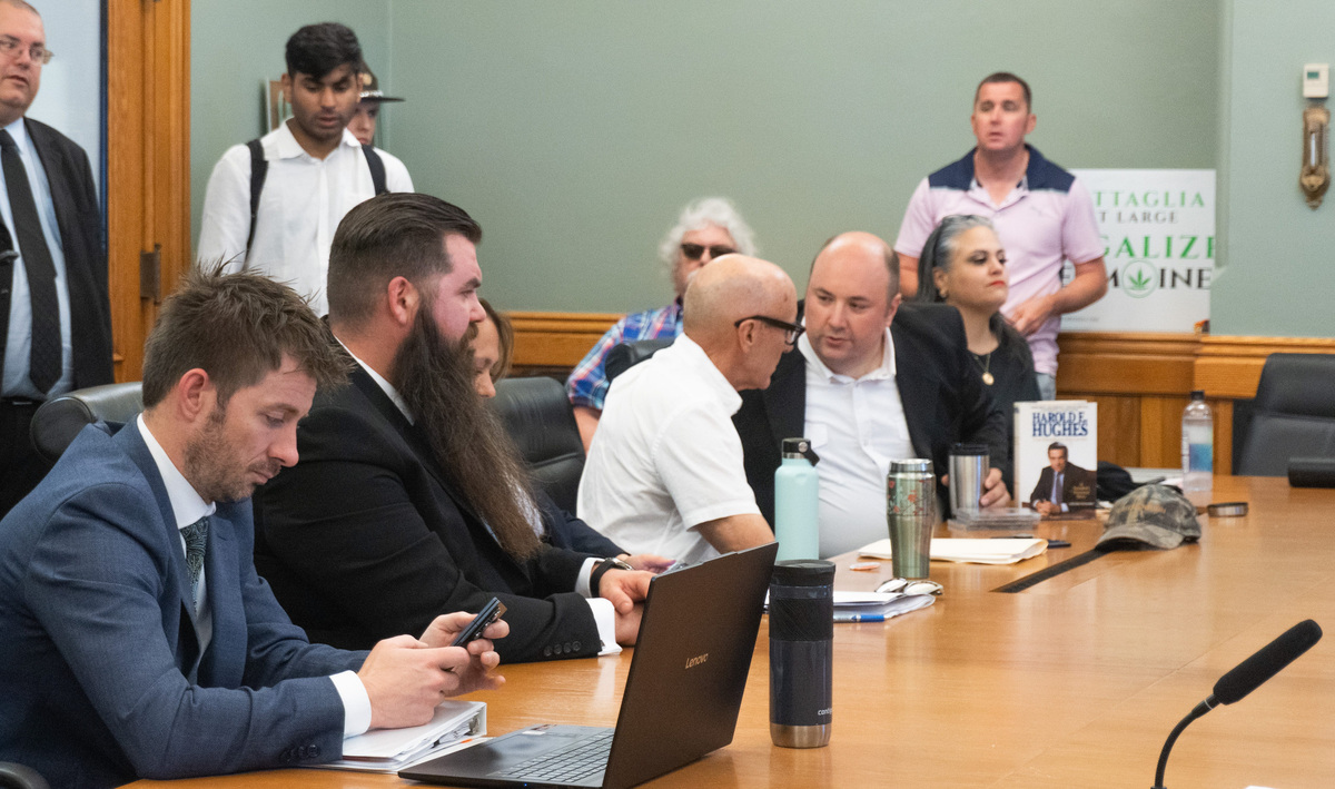 From left to right, attorney Jake Heard, Libertarian gubernatorial candidate Nicholas Gluba, 2nd District candidate Rick Stewart, 3rd District candidate Marco Battaglia and Libertarian Party of Iowa Chair Stephanie Berlin sit June 15 at the Iowa State Capitol.