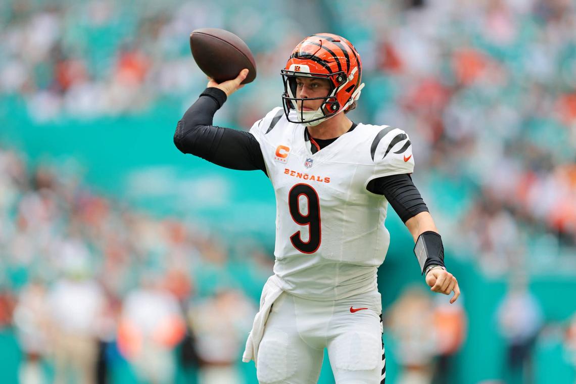  Dec 21, 2025; Miami Gardens, Florida, USA; Cincinnati Bengals quarterback Joe Burrow (9) looks to make a pass during the third quarter against the Cincinnati Bengals at Hard Rock Stadium. Mandatory Credit: Sam Navarro-Imagn Images 