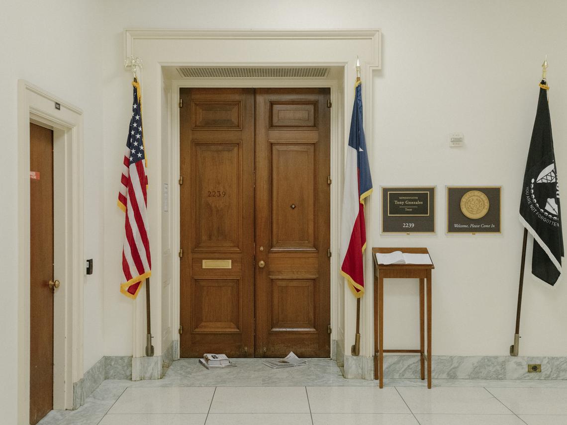 Newspapers in front of former Rep. Tony Gonzales' office at the Canon House Office Building in Washington, on Tuesday, April 14, 2026. Aides to Govs. Greg Abbott of Texas and Gavin Newsom of California are weighing whether to call quick elections to replace Gonzales and Eric Swalwell, respectively, House members accused of sexual misconduct. (Caroline Gutman/The New York Times)
