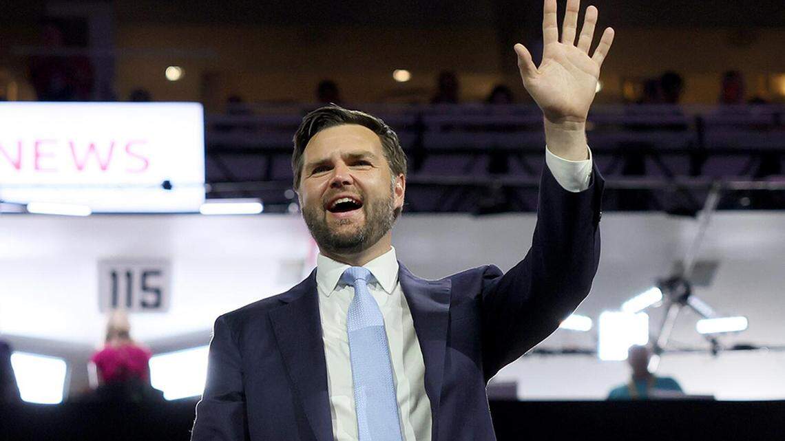 Sen. JD Vance of Ohio, Donald Trump’s vice presidential nominee, waves to the crowd during the first day of the 2024 Republican National Convention at Milwaukee on Monday.