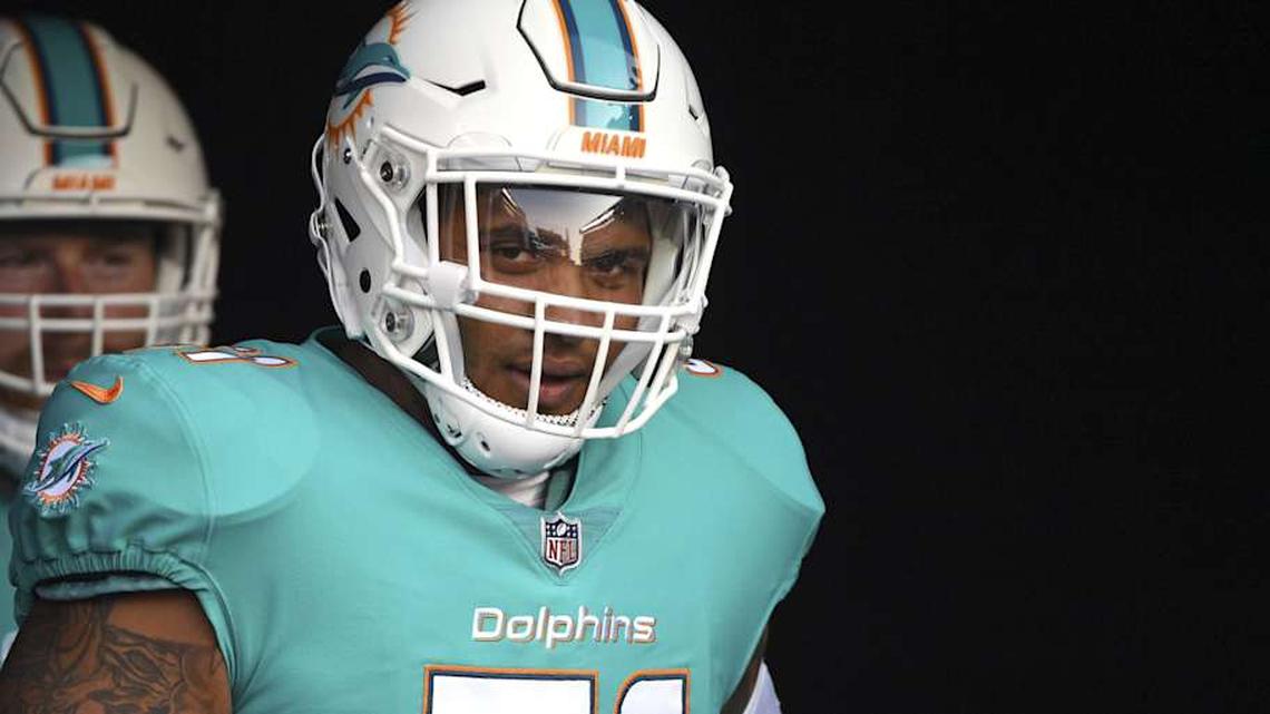  Miami Dolphins center Mike Pouncey (51) waits inside the tunnel before the game against the Philadelphia Eagles at Lincoln Financial Field in the 2017 preseason. | Eric Hartline-Imagn Images 