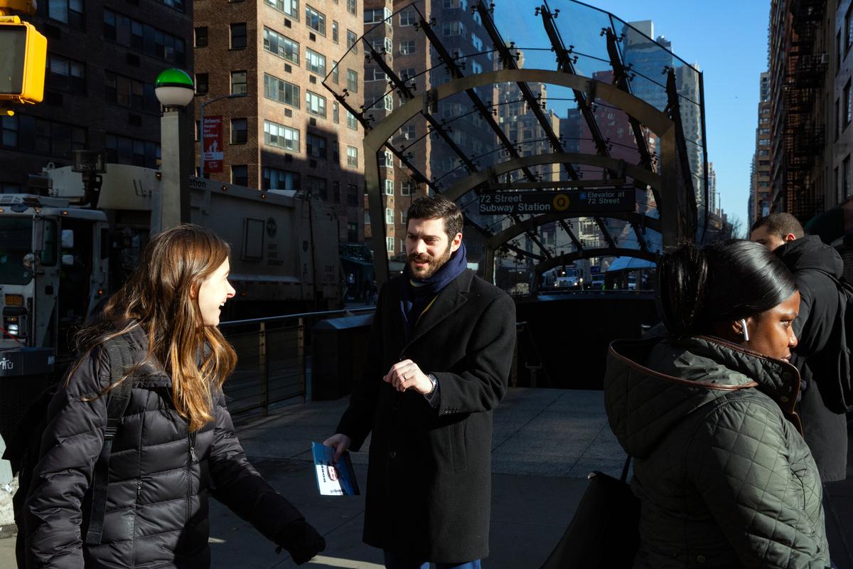 FILE -- Alex Bores, a Democrat and the state assemblyman for the 73rd District of New York, campaigns outside of the 72nd Street subway stop in Manhattan on fe. 27, 2026. He is a candidate for the House seat held by the outgoing Rep. Jerrold Nadler (D-N.Y.) (Sara Hylton/The New York Times)