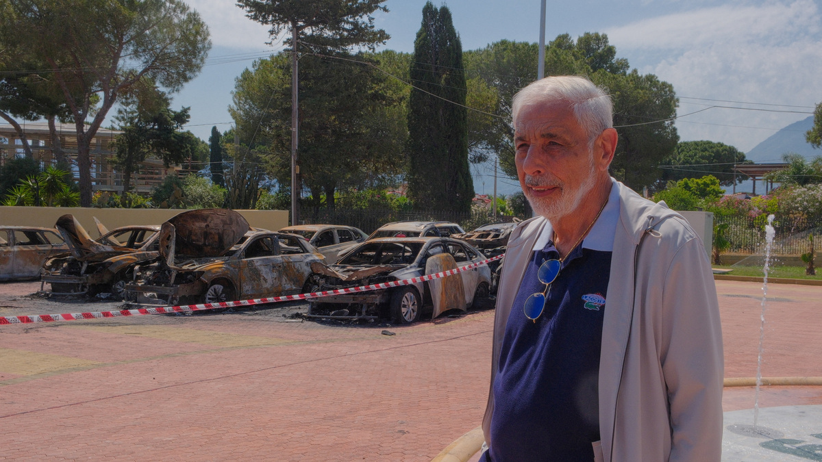 The founder and chairman of Italian car rental company Sicily by Car, Tommaso Dragotto, speaks to journalists at a Sicily by Car depot after an arson attack, in Carini district of Palermo, Sicily, Italy, May 27, 2026. REUTERS/Igor Petyx