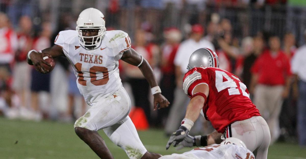 Texas Longhorns quarterback (10) Vince Young runs out of the pocket against Ohio State Buckeyes in the 4th quarter at Ohio Stadium. Longhorns beat the Buckeyes 25-22.