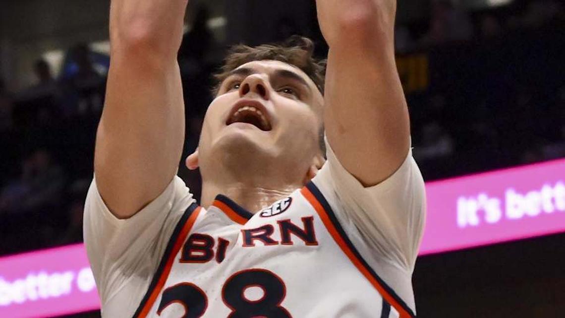  Mar 11, 2026; Nashville, TN, USA; Auburn Tigers forward Filip Jovic (38) shoots over Mississippi State Bulldogs forward Jamarion Davis-Fleming (0) during the first half at Bridgestone Arena. Mandatory Credit: Steve Roberts-Imagn Images | Steve Roberts-Imagn Images 