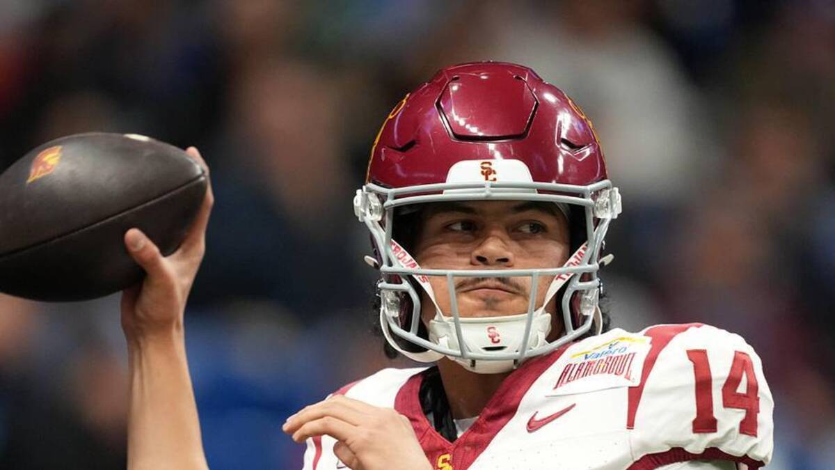  Dec 30, 2025; San Antonio, TX, USA; Southern California Trojans quarterback Jayden Maiava (14) throws the ball against the TCU Horned Frogs in the first half during the Alamo Bowl at Alamodome. Mandatory Credit: Kirby Lee-Imagn Images | Kirby Lee-Imagn Images 