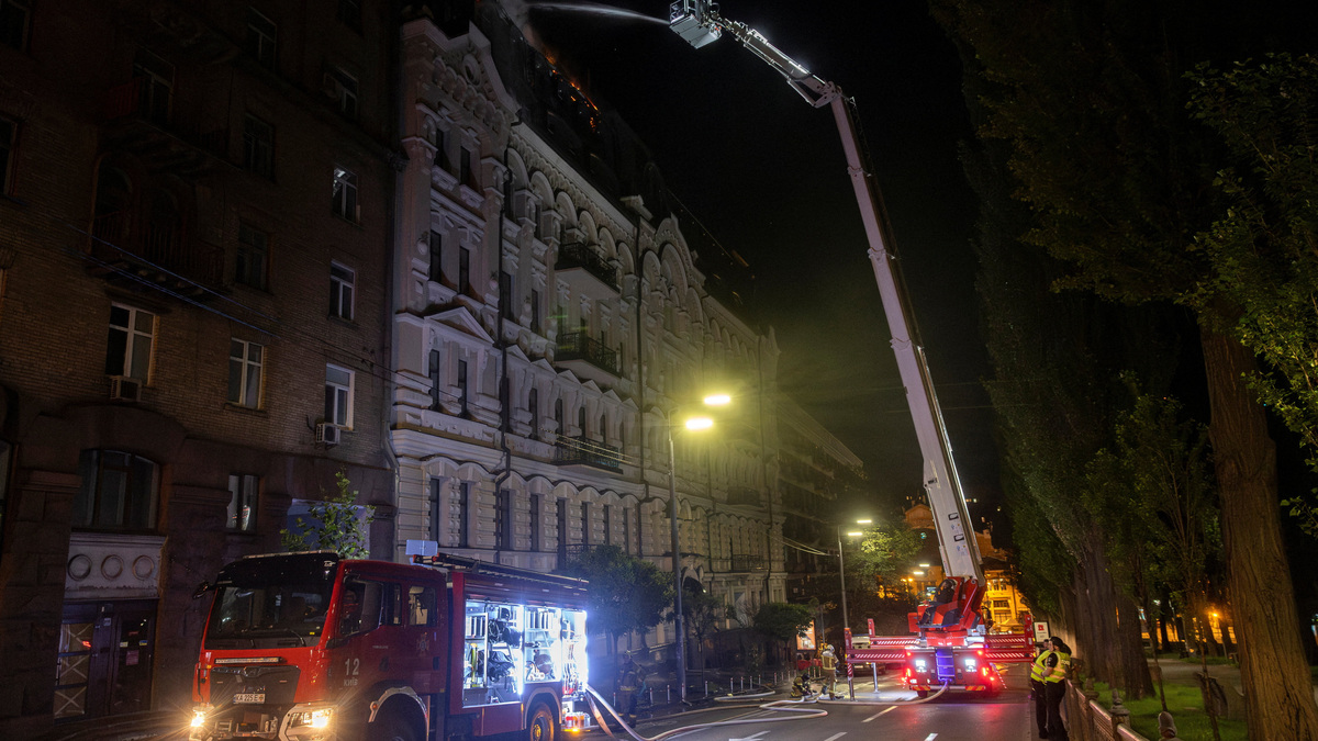 Emergency services work at the site of a strike on a residential building during a night of Russian missile and drone strikes, amid Russia's attack on Ukraine, in Kyiv, Ukraine, July 2, 2026. REUTERS/Thomas Peter