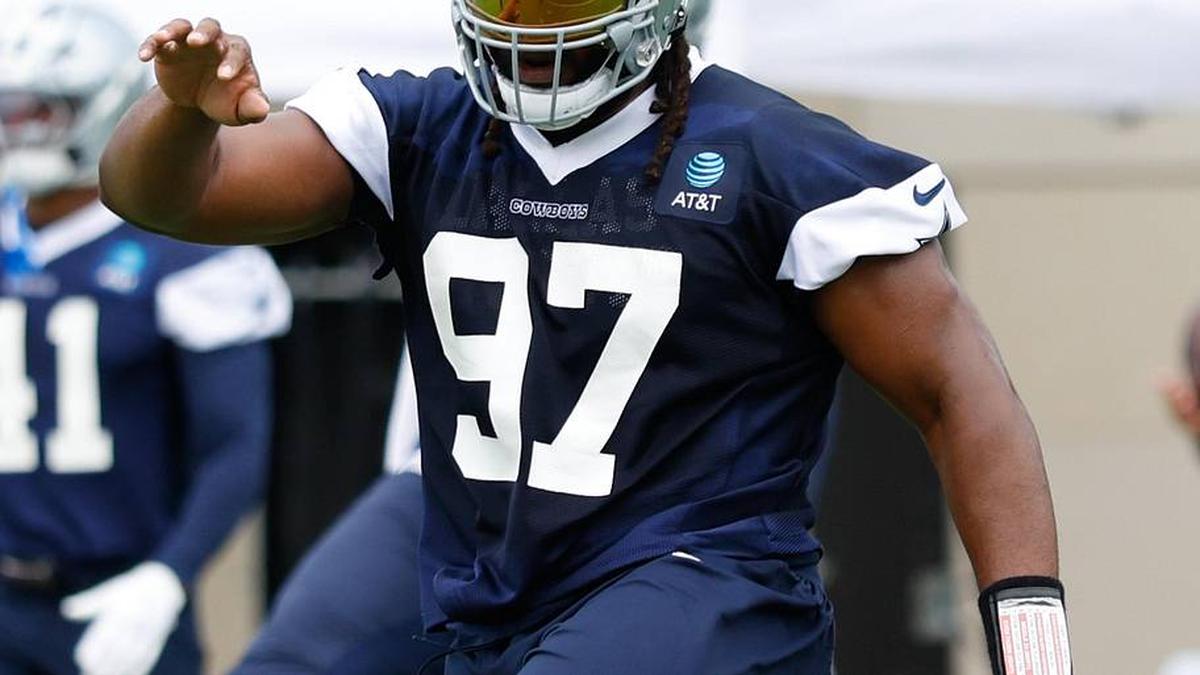  Jun 10, 2025; Arlington, TX, USA; Dallas Cowboys defensive tackle Osa Odighizuwa (97) goes through a drill during practice at the Ford Center at the Star Training Facility in Frisco, Texas. Mandatory Credit: Chris Jones-Imagn Images | Chris Jones-Imagn Images 