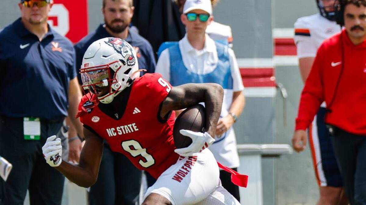  Sep 6, 2025; Raleigh, North Carolina, USA; North Carolina State Wolfpack wide receiver Terrell Anderson (9) runs with the football during the first half of the game against Virginia Cavaliers at Carter-Finley Stadium. Mandatory Credit: Jaylynn Nash-Imagn Images | Jaylynn Nash-Imagn Images 