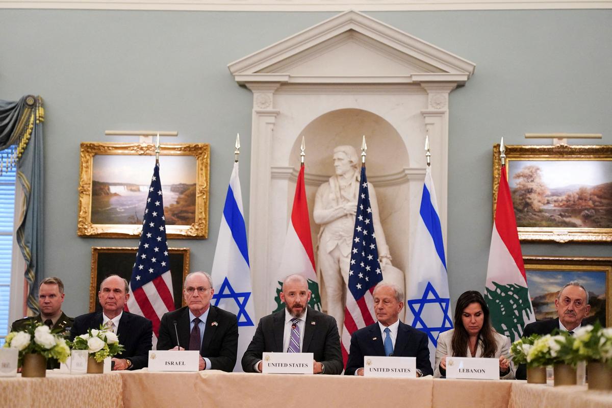 Israeli Ambassador to the U.S. Yechiel Leiter and Lebanese Ambassador to the U.S. Nada Hamadeh, accompanied by State Department Chief of Staff Daniel Holler and U.S. Ambassador to Lebanon Michel Issa, attend a meeting between Israeli and Lebanese delegations hosted by the United States, after the Trump administration said Israel and Lebanon agreed to implement a ceasefire to end hostilities, at the State Department in Washington, D.C., U.S., June 3, 2026. REUTERS/Nathan Howard