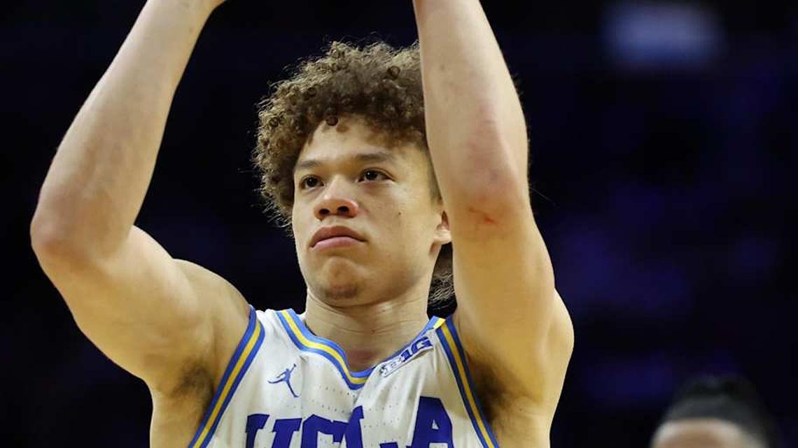  Mar 20, 2026; Philadelphia, PA, USA; UCLA Bruins guard Trent Perry (0) shoots the ball in the second half during a first round game of the men's 2026 NCAA Tournament at Xfinity Mobile Arena. Mandatory Credit: Bill Streicher-Imagn Images | Bill Streicher-Imagn Images 