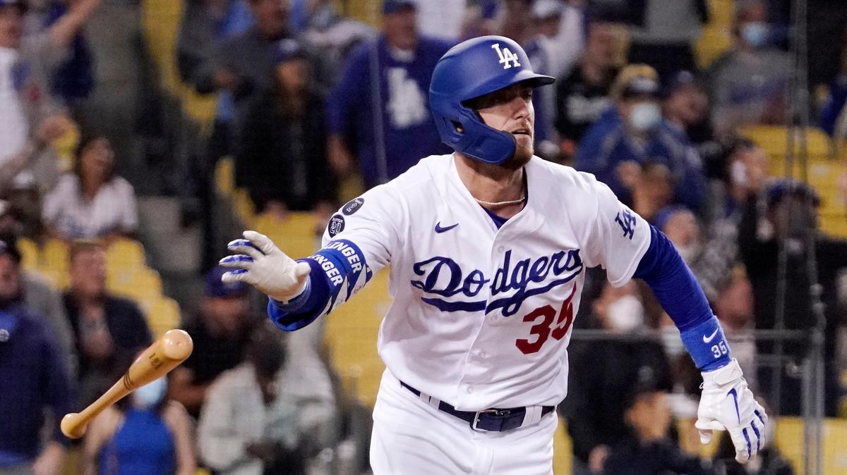 Los Angeles Dodgers’ Cody Bellinger drops hit bat after hitting a solo home run during the eighth inning of a baseball game against the San Diego Padres Wednesday, Sept. 29, 2021, in Los Angeles. (AP Photo/Mark J. Terrill)