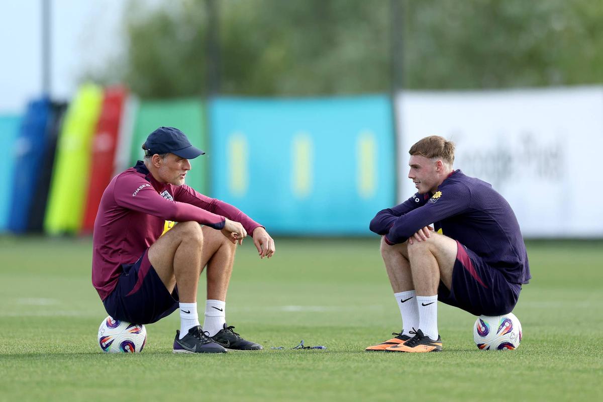  Thomas Tuchel, Head Coach of England, talks to Cole Palmer of England during a training session at the England Men's Senior Team's training base. Photo by Eddie Keogh - The FA/The FA via Getty Images