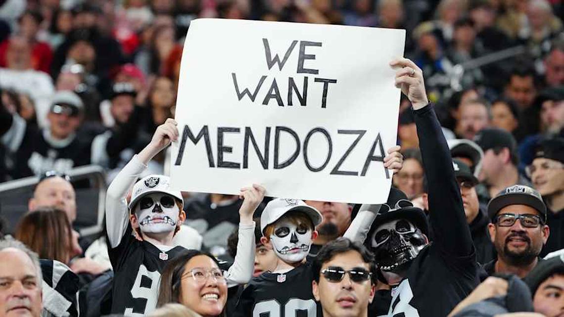  Jan 4, 2026; Paradise, Nevada, USA; Las Vegas Raiders fans hold a sign during a game between the Raiders and the Kansas City Chiefs in the fourth quarter at Allegiant Stadium. Mandatory Credit: Stephen R. Sylvanie-Imagn Images | Stephen R. Sylvanie-Imagn Images 