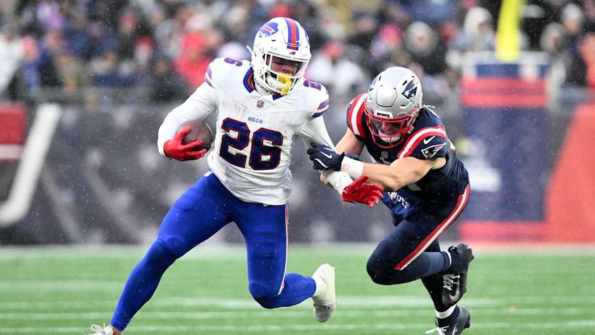  Dec 14, 2025; Foxborough, Massachusetts, USA; Buffalo Bills running back Ty Johnson (26) runs against the New England Patriots during the second half at Gillette Stadium. Mandatory Credit: Brian Fluharty-Imagn Images | Brian Fluharty-Imagn Images 