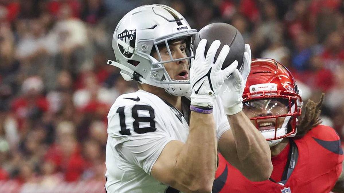  Dec 21, 2025; Houston, Texas, USA; Las Vegas Raiders wide receiver Jack Bech (18) makes a reception as Houston Texans cornerback Derek Stingley Jr. (24) defends during the first half at NRG Stadium. Mandatory Credit: Troy Taormina-Imagn Images | Troy Taormina-Imagn Images 