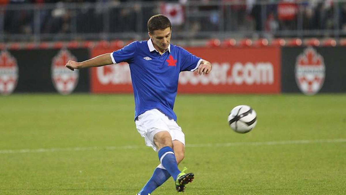  Canada wore blue to celebrate 100 years of Canada Soccer in 2012. | Tom Szczerbowski/Getty Images 