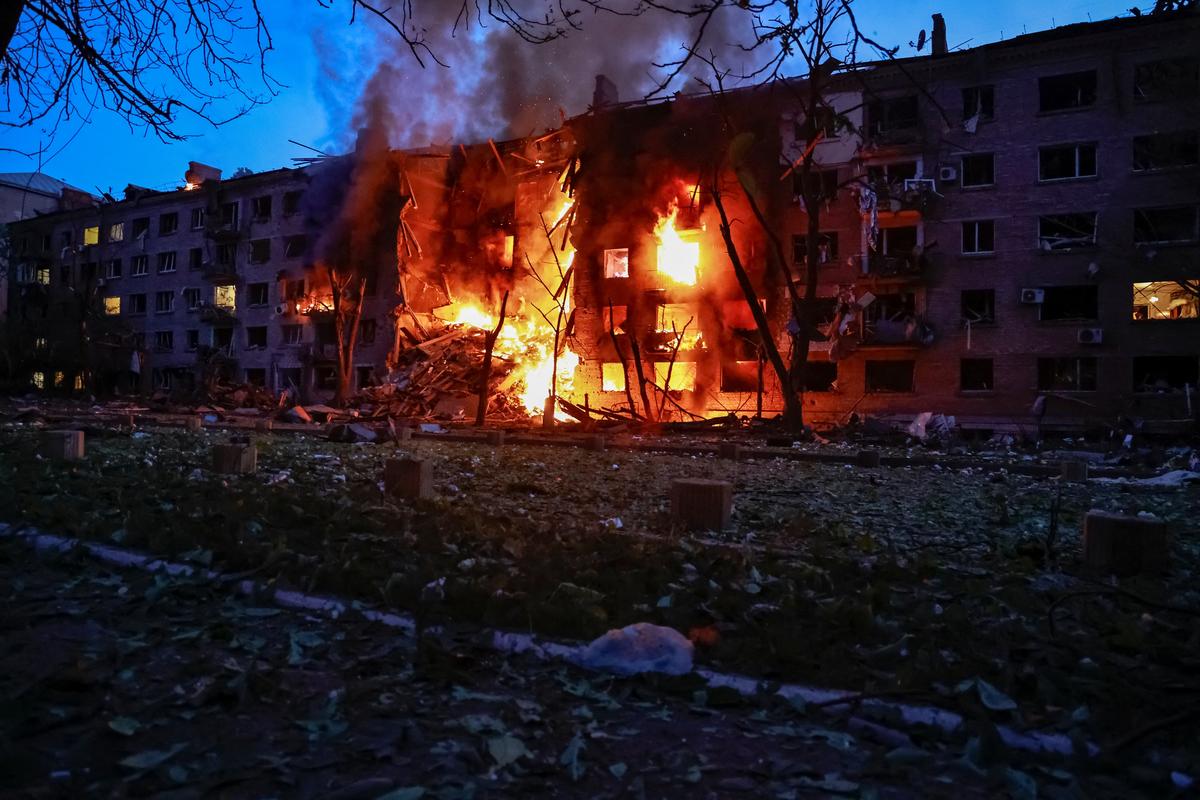 Fire engulfs an apartment building destroyed by a Russian missile and drone strike, amid Russia's attack on Ukraine, in Kyiv, Ukraine May 24, 2026. REUTERS/Stringer