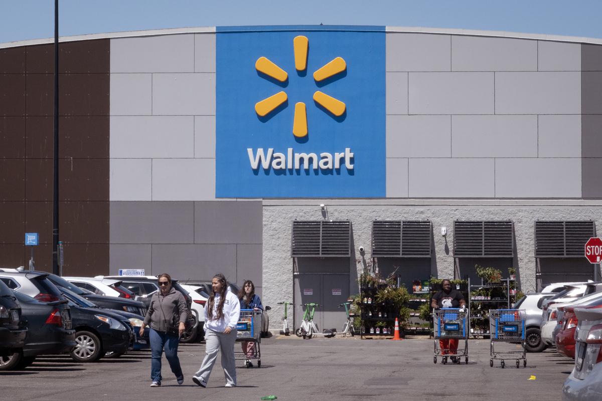  Customers shop at a Walmart store on May 13, 2026 in Chicago, Illinois. 