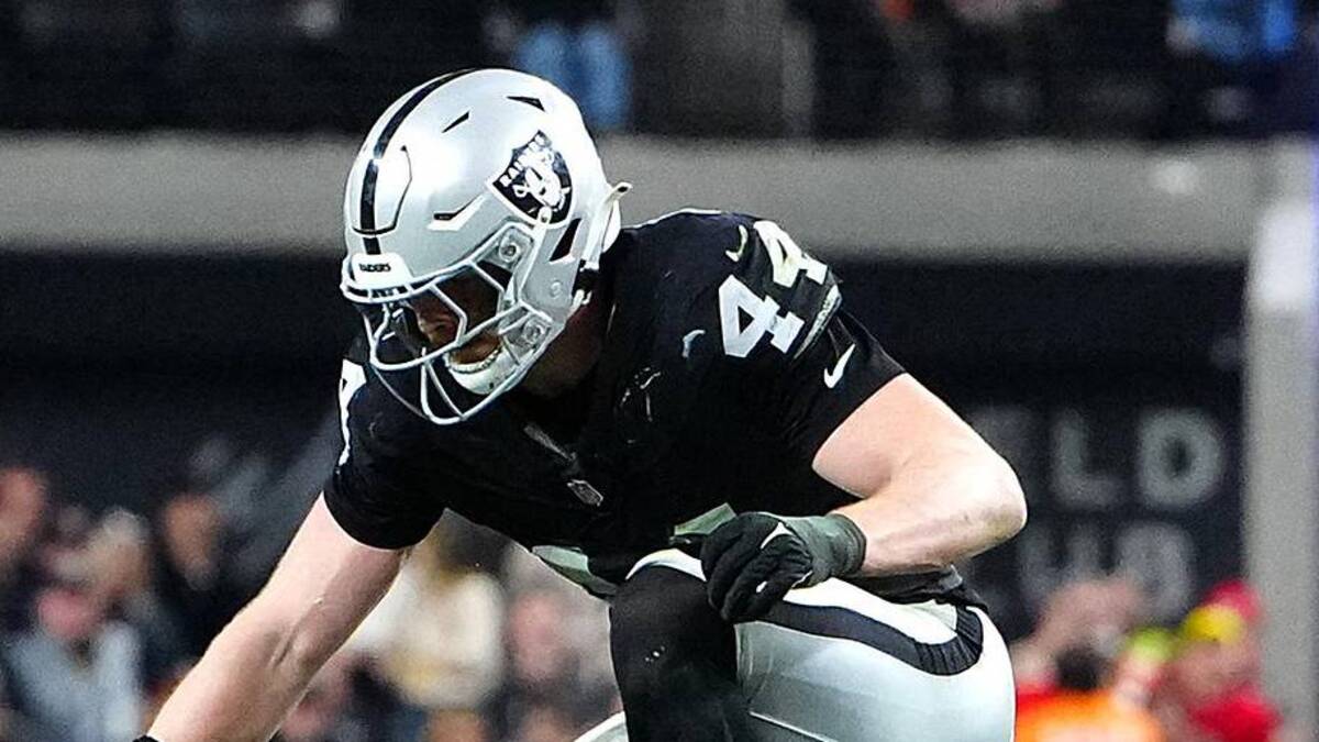  Jan 4, 2026; Paradise, Nevada, USA; Kansas City Chiefs quarterback Shane Buechele (17) is sacked by Las Vegas Raiders linebacker Devin White (45) and defensive end Malcolm Koonce (51) as linebacker Tommy Eichenberg (44) hurdles the play during the second quarter at Allegiant Stadium. Mandatory Credit: Stephen R. Sylvanie-Imagn Images | Stephen R. Sylvanie-Imagn Images 