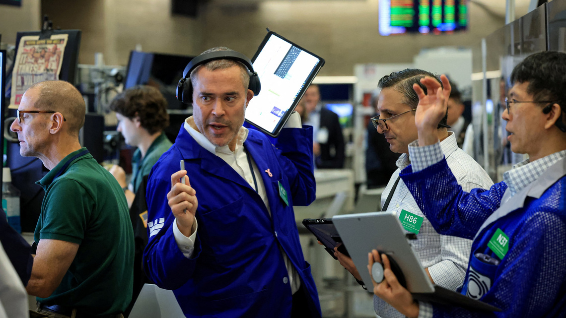 Wall St opens lower ahead of Fed decision; chip stocks wobble