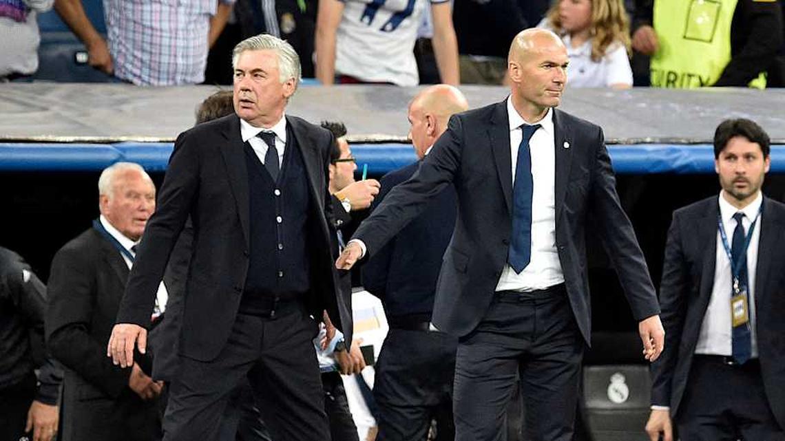  Carlo Ancelotti (left) and Zinedine Zidane are the two best managers in Real Madrid history. | Gerard Julien/AFP/Getty Images 