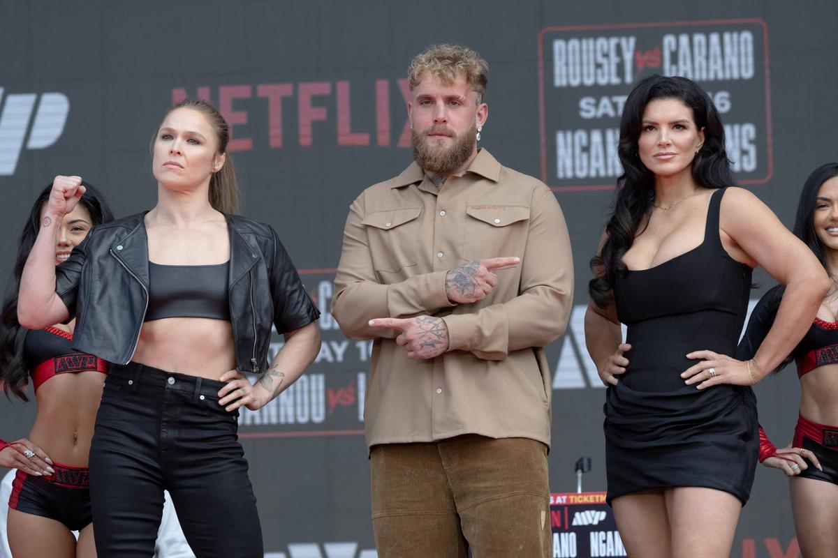  Ronda Rousey, left, Jake Paul, center, and Gina Carano as the fighters face off during a press conference. Hans Gutknecht/Getty Images