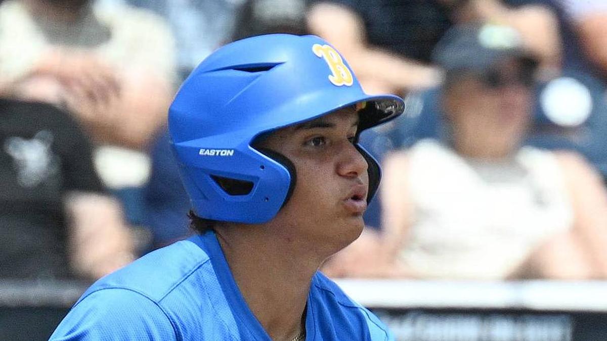 Jun 14, 2025; Omaha, Neb, USA; UCLA Bruins first baseman Mulivai Levu (39) singles against the Murray State Racers during the first inning at Charles Schwab Field. Mandatory Credit: Steven Branscombe-Imagn Images | Steven Branscombe-Imagn Images 