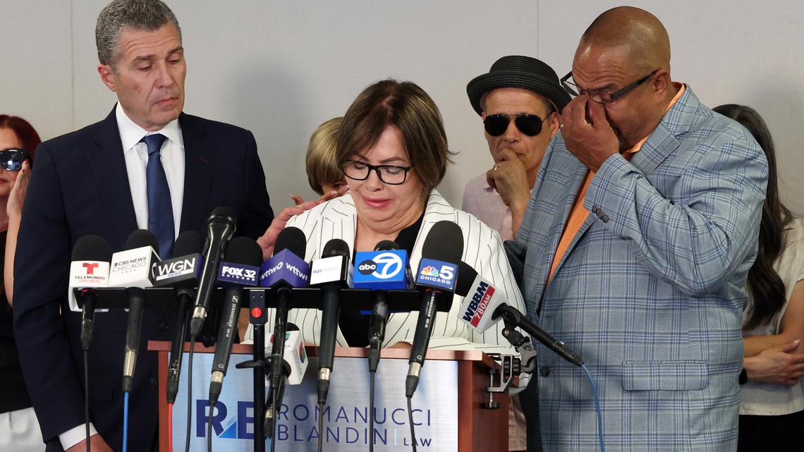 Yolanda Rivera, middle, calls for greater transparency in the investigation into the shooting death of her daughter, Chicago police Officer Krystal Rivera, as attorney Antonio Romanucci, left, and Krystal’s stepfather, Rico Thompson, listen at the Chicago law office of Romanucci & Blandin on July 2, 2025. (Terrence Antonio James/Chicago Tribune/TNS)