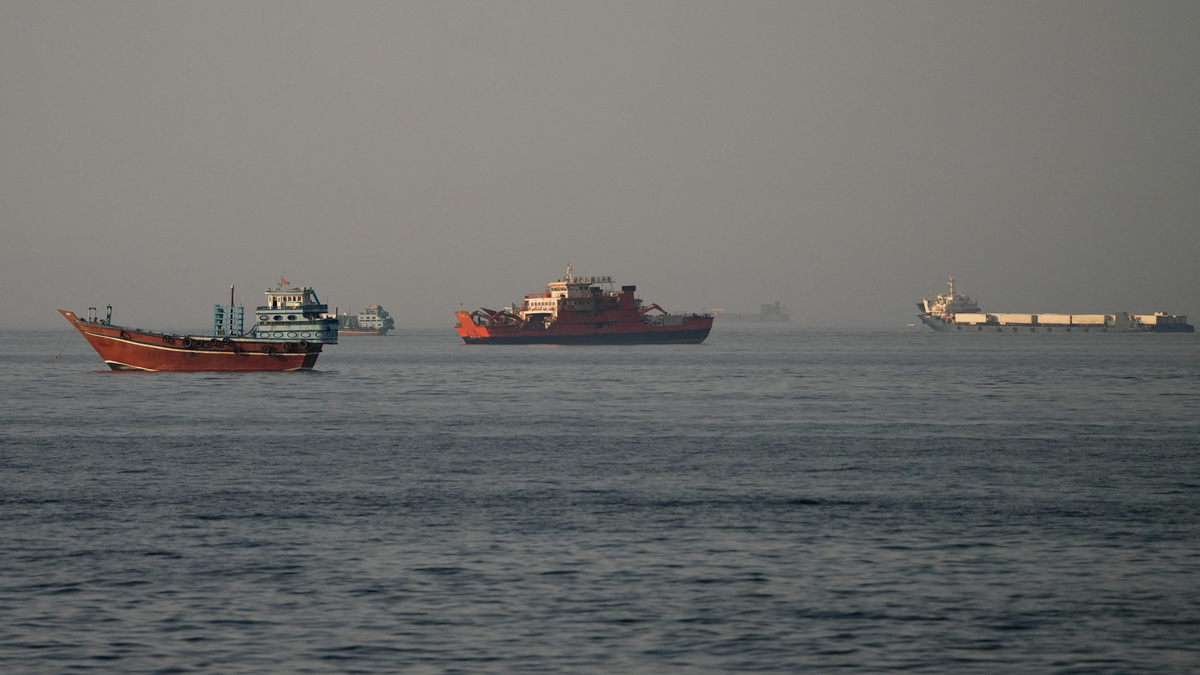 Vessels at the Strait of Hormuz, as seen from Musandam, Oman, June 14, 2026. REUTERS/Stringer
