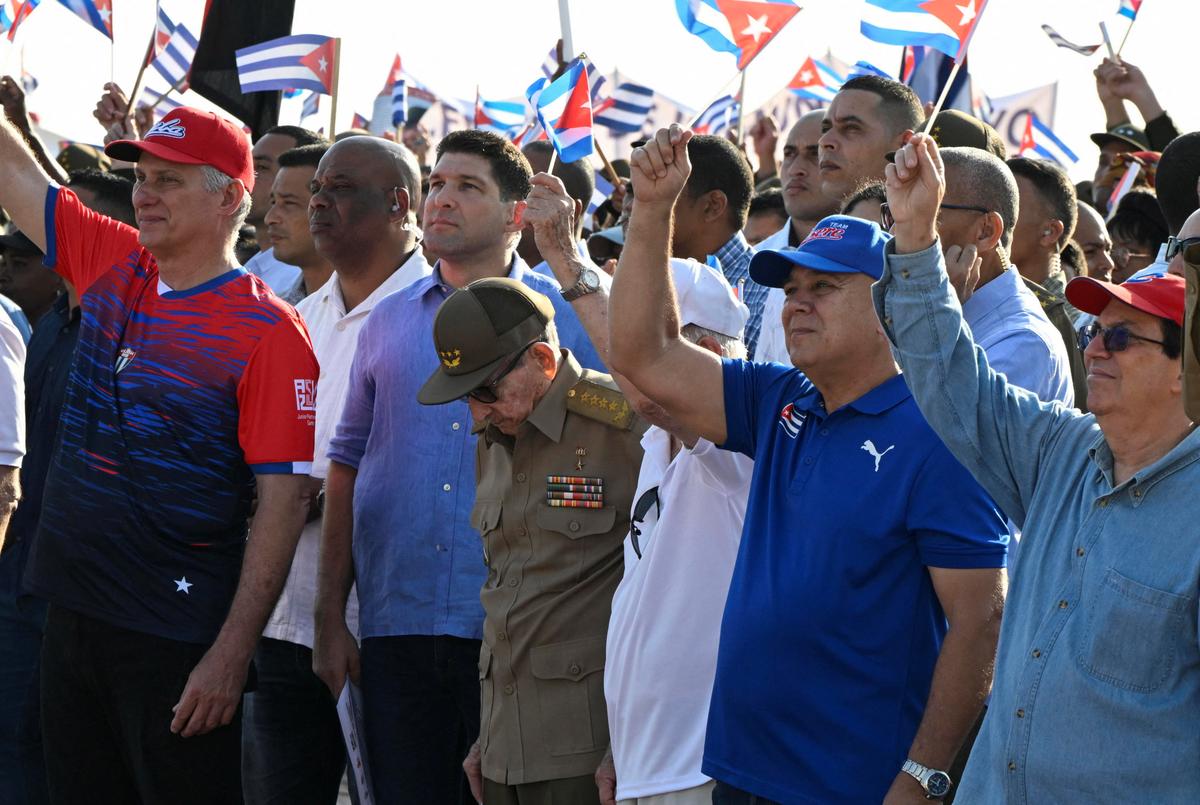 Cuba’s former President Raul Castro, Cuba's President Miguel Diaz-Canel and Raul Castro's grandson Raul Guillermo Rodriguez Castro, known as “El Cangrejo” attend a May Day parade, in Havana, Cuba May 1, 2026. REUTERS/Norlys Perez