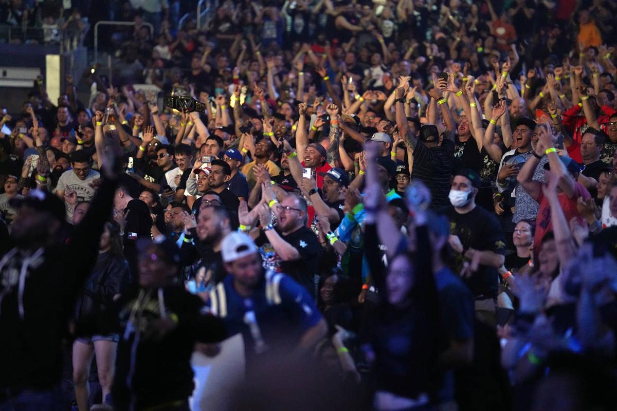  Apr 3, 2022; Arlington, TX, USA; Fans cheer during WrestleMania at AT&T Stadium. Mandatory Credit: Joe Camporeale-USA TODAY Sports 