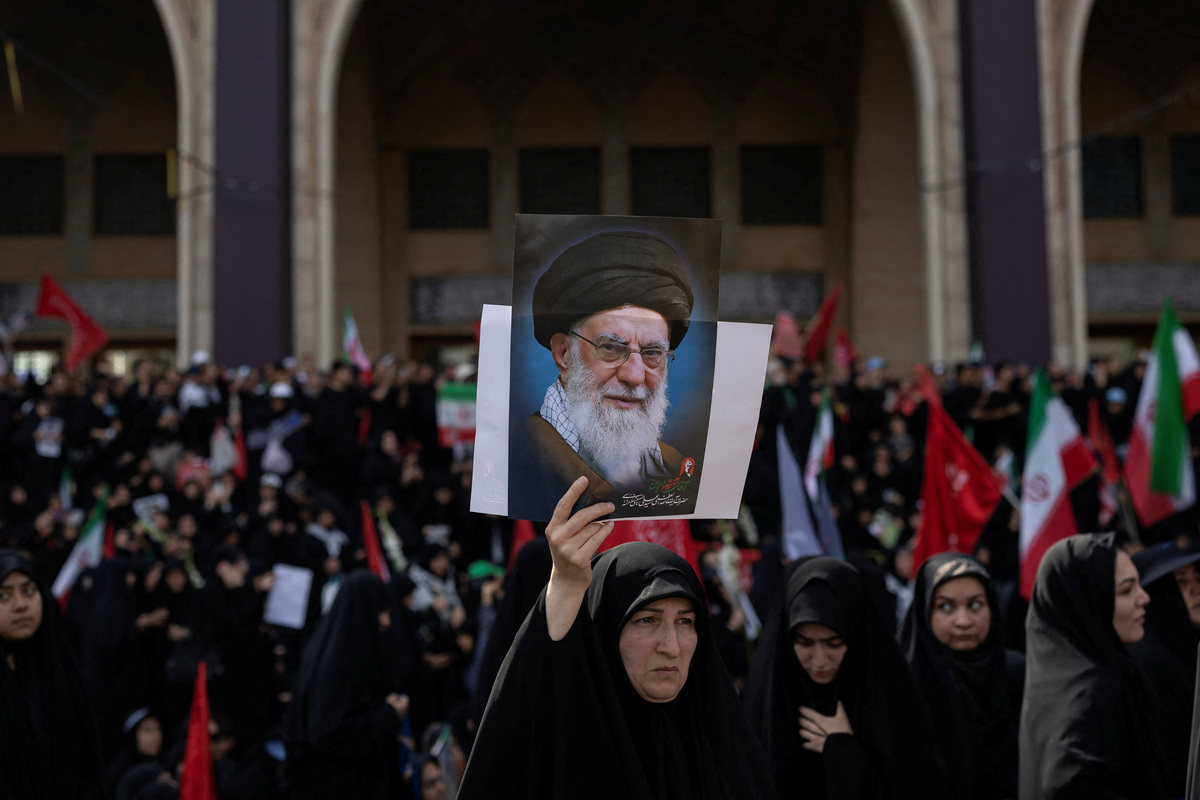 A mourner holds a portrait of late Supreme Leader Ayatollah Ali Khamenei, who was killed on February 28 in Israeli and U.S. airstrikes, during a farewell ceremony at the Imam Khomeini Grand Mosalla, in Tehran, Iran July 4, 2026. REUTERS/Alkis Konstantinidis Foreign media in Iran operate under guidelines set by the Ministry of Culture and Islamic Guidance, which regulates press activity and permissions