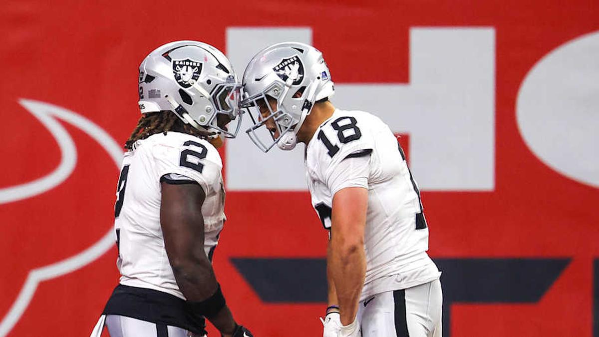  Dec 21, 2025; Houston, Texas, USA; Las Vegas Raiders wide receiver Jack Bech (18) celebrates running back Ashton Jeanty (2) touchdown reception against the Houston Texans in the second half at NRG Stadium. Mandatory Credit: Thomas Shea-Imagn Images | Thomas Shea-Imagn Images 